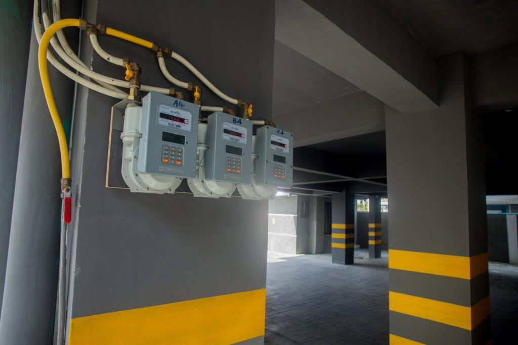 Brum Height 5: Individual electricity meters mounted beside parking bays